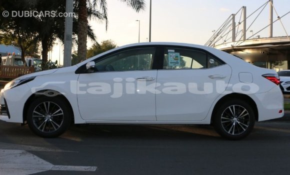 Buy Import Toyota Corolla White Car in Import - Dubai in Dushanbe Buy Import Toyota Corolla White Car in Import - Dubai in Dushanbe