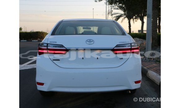 Buy Import Toyota Corolla White Car in Import - Dubai in Dushanbe Buy Import Toyota Corolla White Car in Import - Dubai in Dushanbe