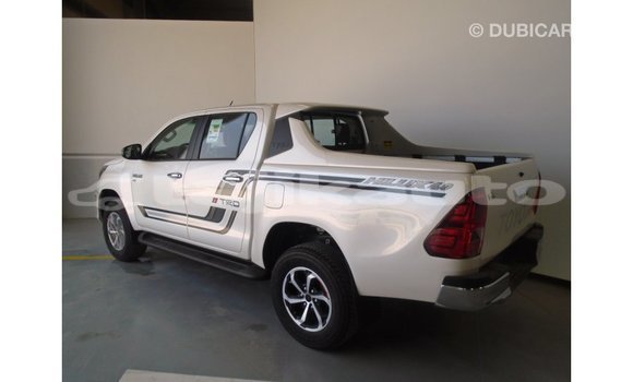 Buy Import Toyota Hilux White Car in Import - Dubai in Dushanbe Buy Import Toyota Hilux White Car in Import - Dubai in Dushanbe