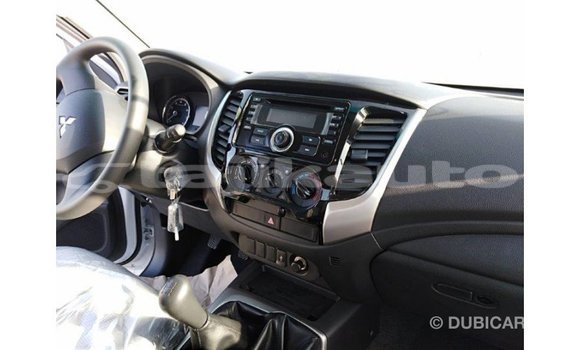 Buy Import Mitsubishi L200 White Car in Import - Dubai in Dushanbe Buy Import Mitsubishi L200 White Car in Import - Dubai in Dushanbe