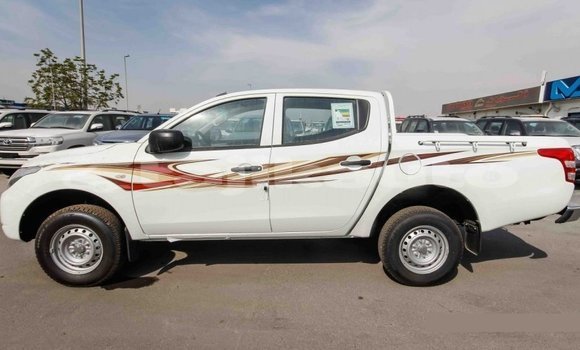 Buy Import Mitsubishi L200 White Car in Import - Dubai in Dushanbe Buy Import Mitsubishi L200 White Car in Import - Dubai in Dushanbe