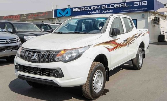 Buy Import Mitsubishi L200 White Car in Import - Dubai in Dushanbe Buy Import Mitsubishi L200 White Car in Import - Dubai in Dushanbe