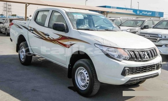 Buy Import Mitsubishi L200 White Car in Import - Dubai in Dushanbe Buy Import Mitsubishi L200 White Car in Import - Dubai in Dushanbe