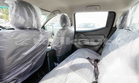 Buy Import Mitsubishi L200 White Car in Import - Dubai in Dushanbe Buy Import Mitsubishi L200 White Car in Import - Dubai in Dushanbe