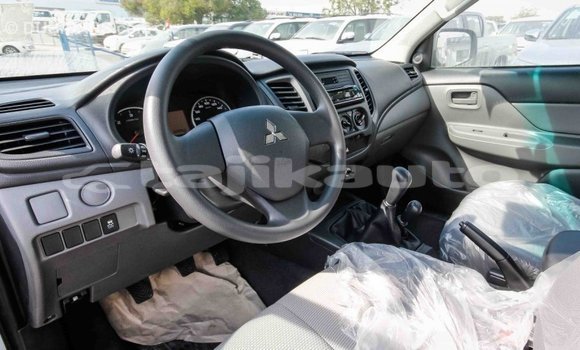 Buy Import Mitsubishi L200 White Car in Import - Dubai in Dushanbe Buy Import Mitsubishi L200 White Car in Import - Dubai in Dushanbe