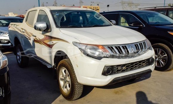 Buy Import Mitsubishi L200 White Car in Import - Dubai in Dushanbe Buy Import Mitsubishi L200 White Car in Import - Dubai in Dushanbe