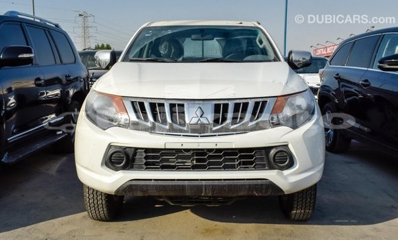 Buy Import Mitsubishi L200 White Car in Import - Dubai in Dushanbe Buy Import Mitsubishi L200 White Car in Import - Dubai in Dushanbe