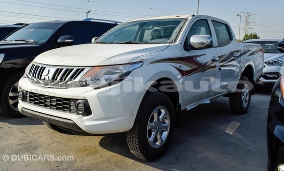 Buy Import Mitsubishi L200 White Car in Import - Dubai in Dushanbe Buy Import Mitsubishi L200 White Car in Import - Dubai in Dushanbe