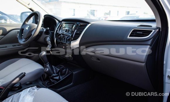 Buy Import Mitsubishi L200 White Car in Import - Dubai in Dushanbe Buy Import Mitsubishi L200 White Car in Import - Dubai in Dushanbe