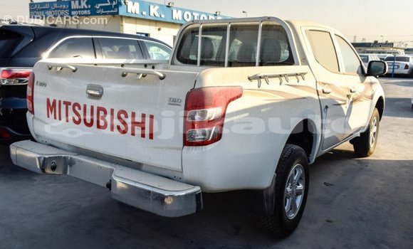 Buy Import Mitsubishi L200 White Car in Import - Dubai in Dushanbe Buy Import Mitsubishi L200 White Car in Import - Dubai in Dushanbe