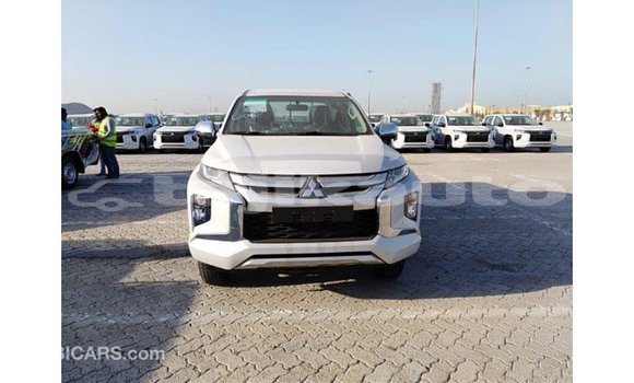 Buy Import Mitsubishi L200 White Car in Import - Dubai in Dushanbe Buy Import Mitsubishi L200 White Car in Import - Dubai in Dushanbe