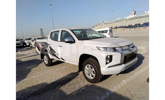 Buy Import Mitsubishi L200 White Car in Import - Dubai in Dushanbe Buy Import Mitsubishi L200 White Car in Import - Dubai in Dushanbe