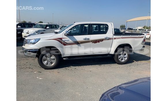 Buy Import Toyota Hilux White Car in Import - Dubai in Dushanbe Buy Import Toyota Hilux White Car in Import - Dubai in Dushanbe