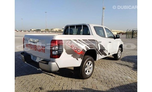 Buy Import Mitsubishi L200 White Car in Import - Dubai in Dushanbe Buy Import Mitsubishi L200 White Car in Import - Dubai in Dushanbe
