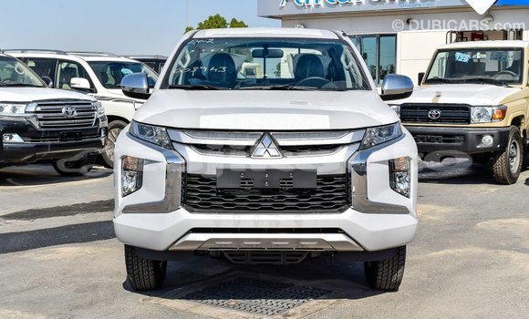 Buy Import Mitsubishi L200 White Car in Import - Dubai in Dushanbe Buy Import Mitsubishi L200 White Car in Import - Dubai in Dushanbe