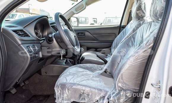 Buy Import Mitsubishi L200 White Car in Import - Dubai in Dushanbe Buy Import Mitsubishi L200 White Car in Import - Dubai in Dushanbe