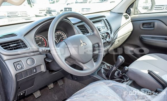 Buy Import Mitsubishi L200 White Car in Import - Dubai in Dushanbe Buy Import Mitsubishi L200 White Car in Import - Dubai in Dushanbe