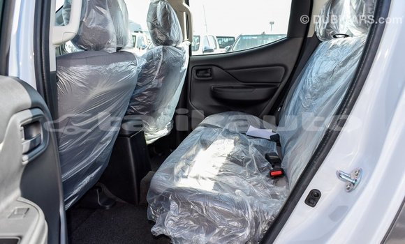 Buy Import Mitsubishi L200 White Car in Import - Dubai in Dushanbe Buy Import Mitsubishi L200 White Car in Import - Dubai in Dushanbe