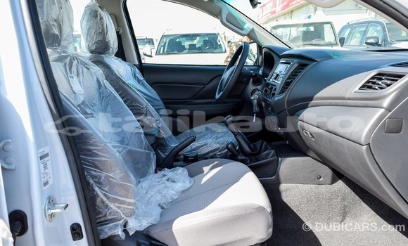 Buy Import Mitsubishi L200 White Car in Import - Dubai in Dushanbe Buy Import Mitsubishi L200 White Car in Import - Dubai in Dushanbe