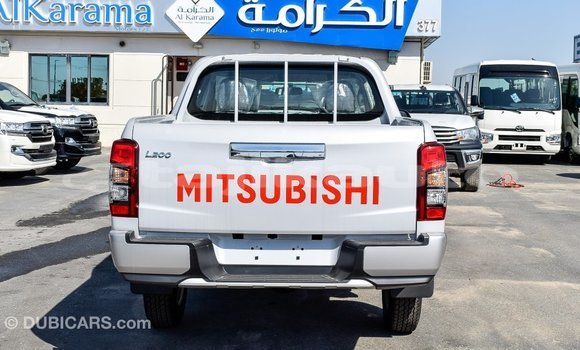 Buy Import Mitsubishi L200 White Car in Import - Dubai in Dushanbe Buy Import Mitsubishi L200 White Car in Import - Dubai in Dushanbe