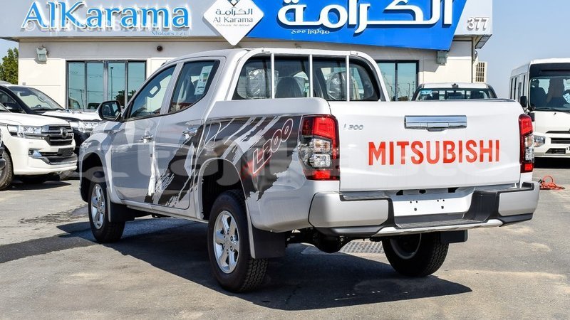 Big with watermark mitsubishi l200 dushanbe import dubai 1924