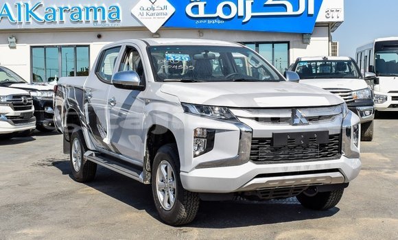Buy Import Mitsubishi L200 White Car in Import - Dubai in Dushanbe Buy Import Mitsubishi L200 White Car in Import - Dubai in Dushanbe