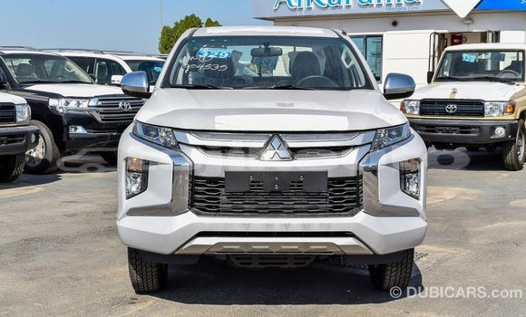 Buy Import Mitsubishi L200 White Car in Import - Dubai in Dushanbe Buy Import Mitsubishi L200 White Car in Import - Dubai in Dushanbe