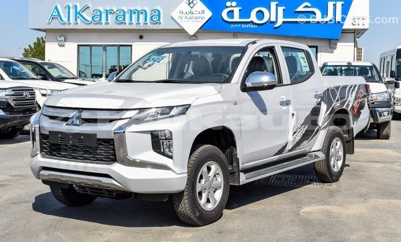 Buy Import Mitsubishi L200 White Car in Import - Dubai in Dushanbe Buy Import Mitsubishi L200 White Car in Import - Dubai in Dushanbe