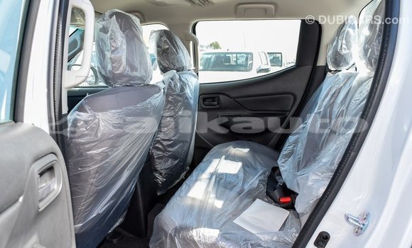 Buy Import Mitsubishi L200 White Car in Import - Dubai in Dushanbe Buy Import Mitsubishi L200 White Car in Import - Dubai in Dushanbe