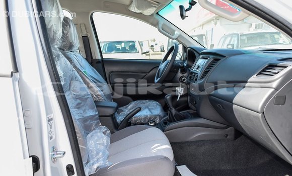 Buy Import Mitsubishi L200 White Car in Import - Dubai in Dushanbe Buy Import Mitsubishi L200 White Car in Import - Dubai in Dushanbe