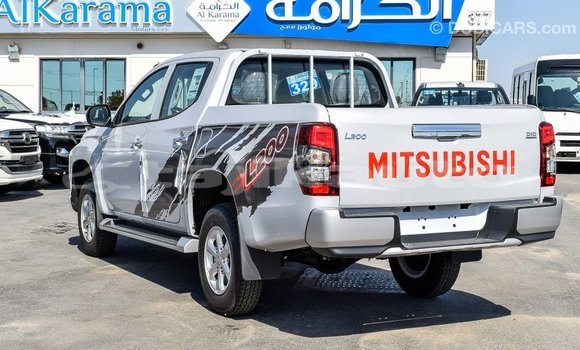 Buy Import Mitsubishi L200 White Car in Import - Dubai in Dushanbe Buy Import Mitsubishi L200 White Car in Import - Dubai in Dushanbe