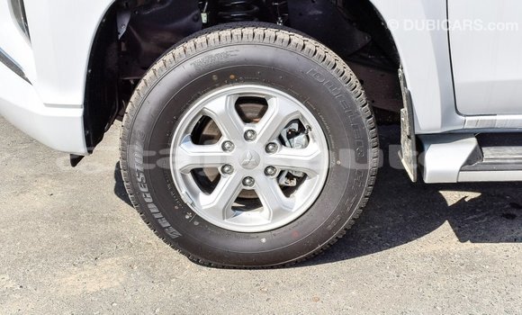 Buy Import Mitsubishi L200 White Car in Import - Dubai in Dushanbe Buy Import Mitsubishi L200 White Car in Import - Dubai in Dushanbe