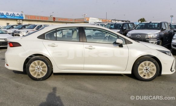 Buy Import Toyota Corolla White Car in Import - Dubai in Dushanbe Buy Import Toyota Corolla White Car in Import - Dubai in Dushanbe