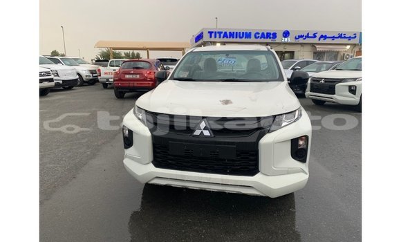 Buy Import Mitsubishi L200 White Car in Import - Dubai in Dushanbe Buy Import Mitsubishi L200 White Car in Import - Dubai in Dushanbe