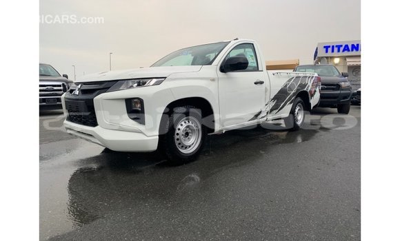 Buy Import Mitsubishi L200 White Car in Import - Dubai in Dushanbe Buy Import Mitsubishi L200 White Car in Import - Dubai in Dushanbe