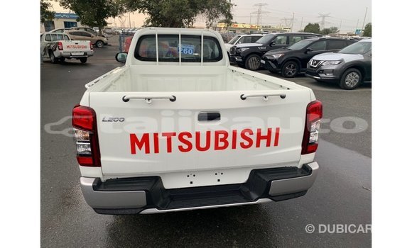 Buy Import Mitsubishi L200 White Car in Import - Dubai in Dushanbe Buy Import Mitsubishi L200 White Car in Import - Dubai in Dushanbe