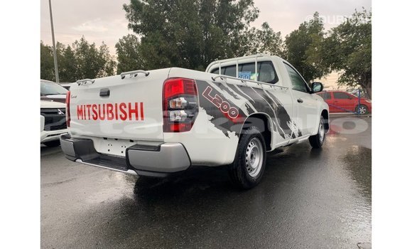Buy Import Mitsubishi L200 White Car in Import - Dubai in Dushanbe Buy Import Mitsubishi L200 White Car in Import - Dubai in Dushanbe
