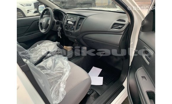 Buy Import Mitsubishi L200 White Car in Import - Dubai in Dushanbe Buy Import Mitsubishi L200 White Car in Import - Dubai in Dushanbe