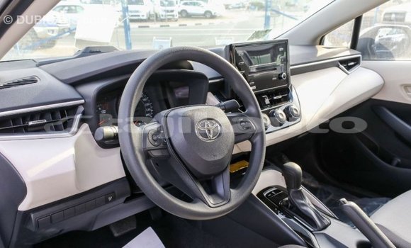 Buy Import Toyota Corolla White Car in Import - Dubai in Dushanbe Buy Import Toyota Corolla White Car in Import - Dubai in Dushanbe