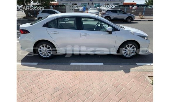 Buy Import Toyota Corolla White Car in Import - Dubai in Dushanbe Buy Import Toyota Corolla White Car in Import - Dubai in Dushanbe