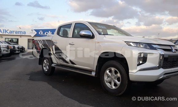 Buy Import Mitsubishi L200 White Car in Import - Dubai in Dushanbe Buy Import Mitsubishi L200 White Car in Import - Dubai in Dushanbe