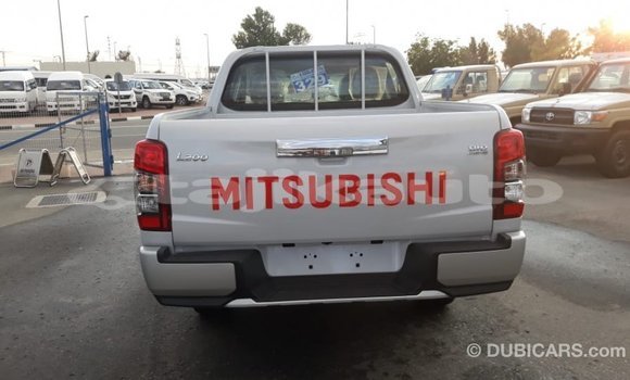 Buy Import Mitsubishi L200 White Car in Import - Dubai in Dushanbe Buy Import Mitsubishi L200 White Car in Import - Dubai in Dushanbe