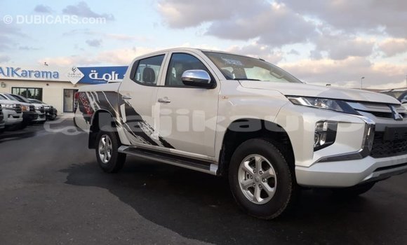 Buy Import Mitsubishi L200 White Car in Import - Dubai in Dushanbe Buy Import Mitsubishi L200 White Car in Import - Dubai in Dushanbe