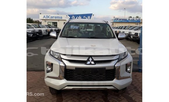 Buy Import Mitsubishi L200 White Car in Import - Dubai in Dushanbe Buy Import Mitsubishi L200 White Car in Import - Dubai in Dushanbe