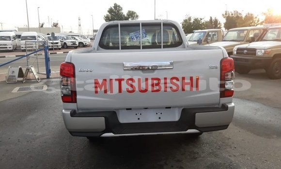 Buy Import Mitsubishi L200 White Car in Import - Dubai in Dushanbe Buy Import Mitsubishi L200 White Car in Import - Dubai in Dushanbe
