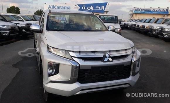 Buy Import Mitsubishi L200 White Car in Import - Dubai in Dushanbe Buy Import Mitsubishi L200 White Car in Import - Dubai in Dushanbe
