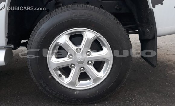 Buy Import Mitsubishi L200 White Car in Import - Dubai in Dushanbe Buy Import Mitsubishi L200 White Car in Import - Dubai in Dushanbe
