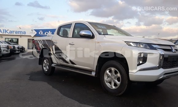 Buy Import Mitsubishi L200 White Car in Import - Dubai in Dushanbe Buy Import Mitsubishi L200 White Car in Import - Dubai in Dushanbe