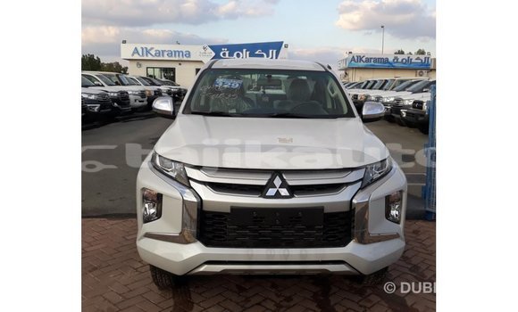 Buy Import Mitsubishi L200 White Car in Import - Dubai in Dushanbe Buy Import Mitsubishi L200 White Car in Import - Dubai in Dushanbe