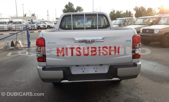 Buy Import Mitsubishi L200 White Car in Import - Dubai in Dushanbe Buy Import Mitsubishi L200 White Car in Import - Dubai in Dushanbe